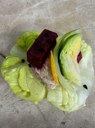 Walnut hummus, baby gem, pomegranate, candy beetroot, pickled sprout, nigella seed