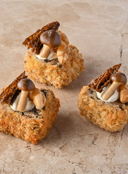 Wild mushroom arancini, truffled creme, walnut