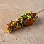 Yakitori chicken skewer, toasted sesame, soy ginger, spring onion