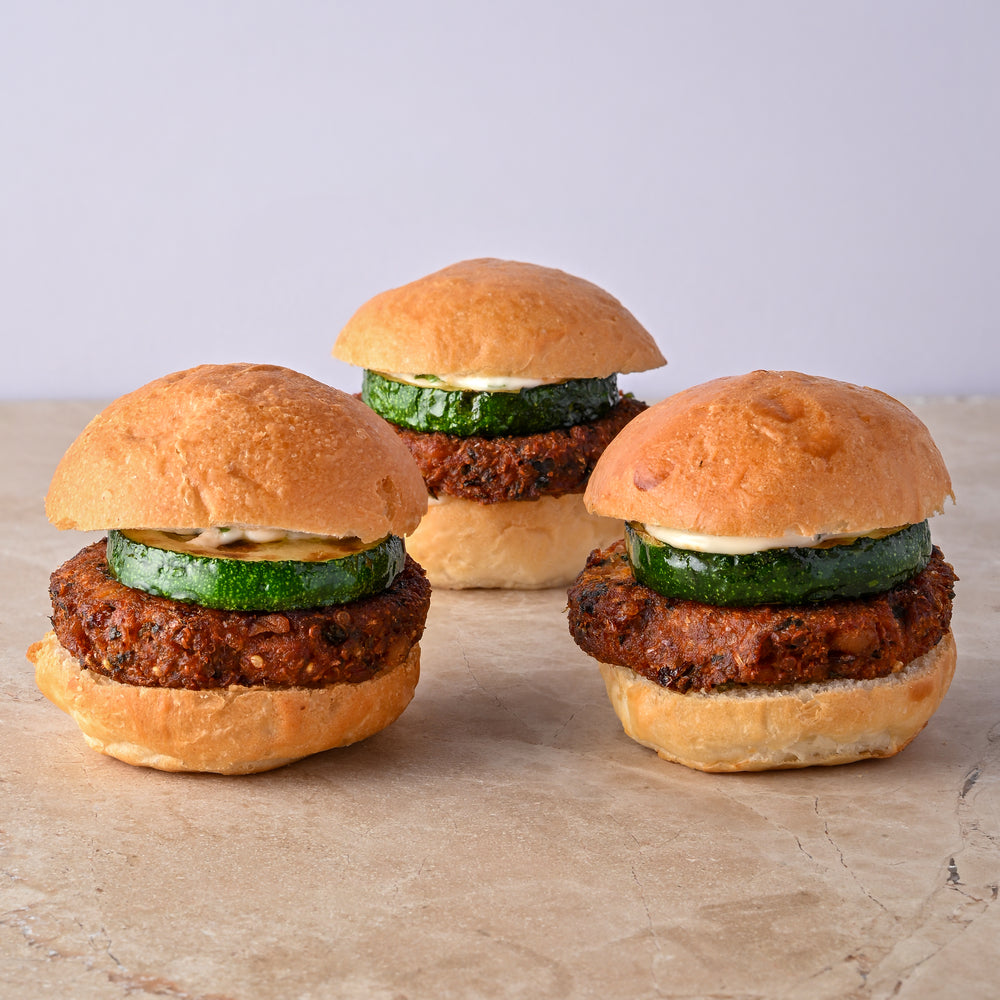 Quinoa and coriander falafel burger, fried courgette, tahini lime aioli, fresh mint leaf