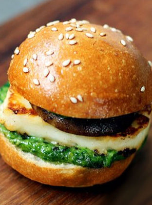 Baked halloumi and roast chestnut mushroom burger with three herb aioli