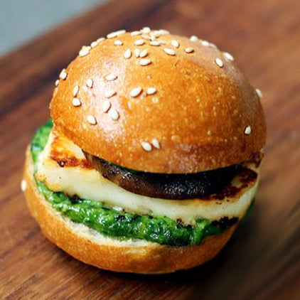 Baked halloumi and roast chestnut mushroom burger with three herb aioli