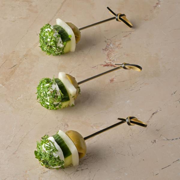 Dill and chive rolled Boilie goats cheese, raw fennel, coriander pickled cucumber, green olive img