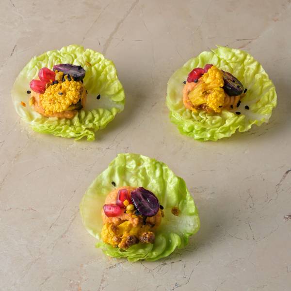Harissa red pepper hummus, ras-el-hanout roast cauliflower, pomegranate, blushed grape, baby gem - Image 2