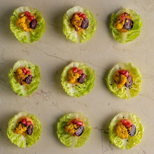 Harissa red pepper hummus, ras-el-hanout roast cauliflower, pomegranate, blushed grape, baby gem_3 img