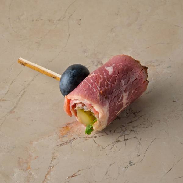 Rolled hot smoked brisket beef, coriander leaf, pickled cucumber, chipotle mayo, blueberry img