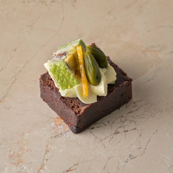 Salted caramel brownie, pistachio, nougat, passionfruit cream img
